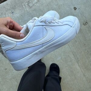 Size 6.5 Women’s- White Nike- never worn.